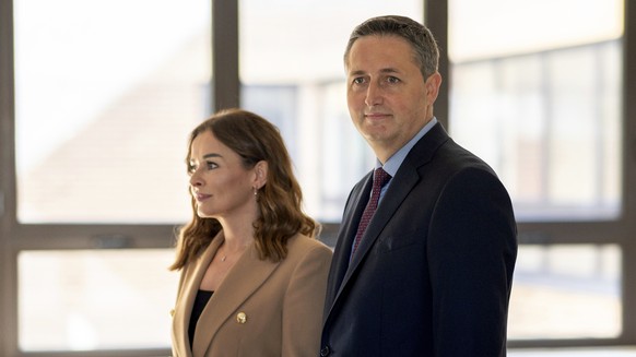 Denis Becirovic of Social Democratic Party (SDP), who is running for the Bosniak seat on the joint presidency, arrives with is wife Mirela to casts his ballot in Tuzla, Bosnia, Sunday, Oct. 2, 2022. P ...
