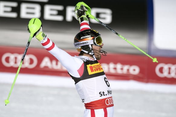 epa05803712 Marcel Hirscher of Austria celebrates winning the Men&#039;s Slalom race at the 2017 FIS Alpine Skiing World Championships in St. Moritz, Switzerland, 19 February 2017. EPA/PETER SCHNEIDER