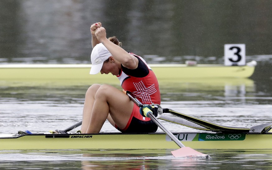Jeanine Gmelin, of Switzerland, reacts after competing in the women&#039;s rowing single sculls semifinal during the 2016 Summer Olympics in Rio de Janeiro, Brazil, Friday, Aug. 12, 2016. (AP Photo/Lu ...