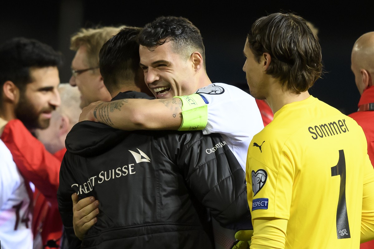 Switzerland's forward Granit Xhaka, center, celebrates after winning the game (6-1) with teammates, during the UEFA Euro 2020 qualifying Group D soccer match between Gibraltar and Switzerland, at ...