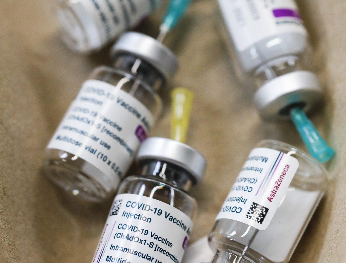 Empty vials of the Astra Zeneca new coronavirus vaccine are seen in the 'Austria Center Vienna' in Vienna, Austria, Friday, April 9, 2021. (AP Photo/Lisa Leutner)