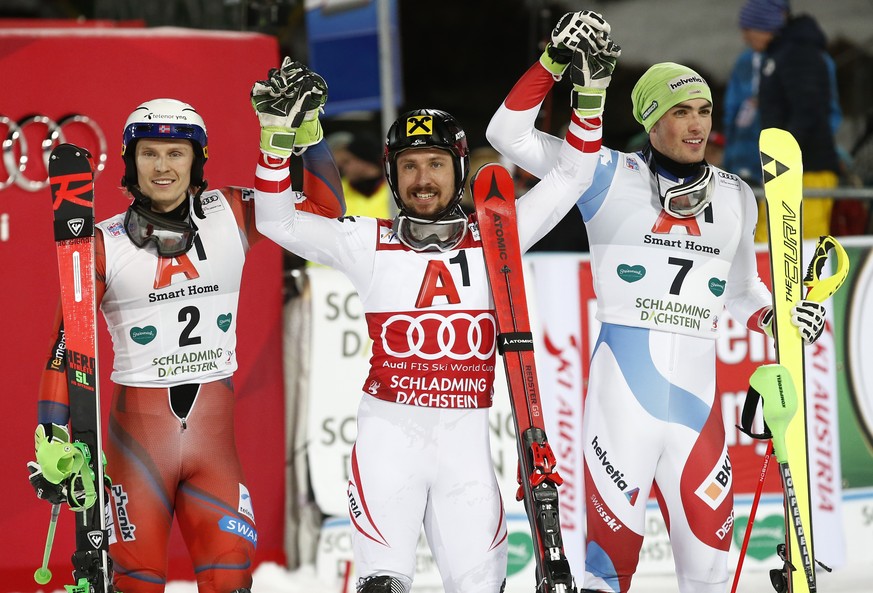 From left, Norway&#039;s Henrik Kristoffersen, second placed, Austria&#039;s Marcel Hirscher, the winner, and third placed Switzerland&#039;s Daniel Yule, celebrate at finish line after an alpine ski, ...