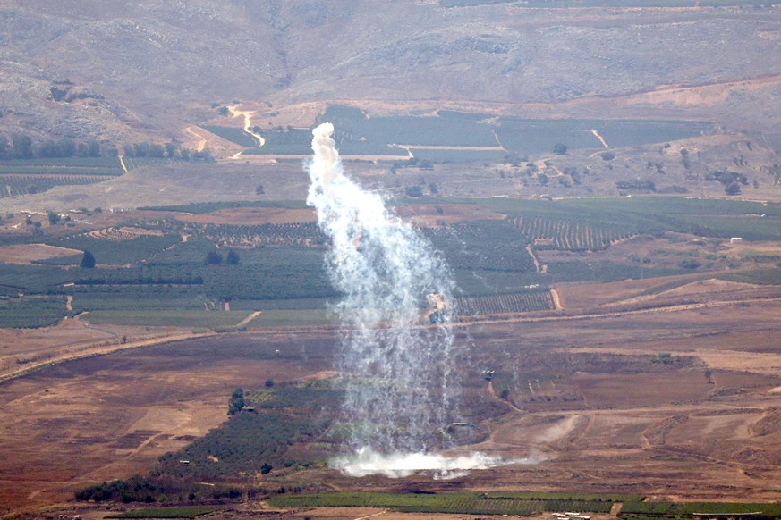 epa11527406 Israeli artillery shells the area of Wazzani in south Lebanon, as seen from the upper Galilee, northern Israel, 05 August 2024. The Israeli army reported 05 August that the Aerial Defense  ...
