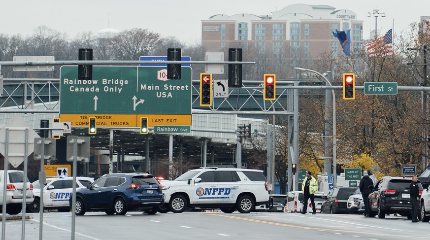 epaselect epa10990012 Law enforcement secure the roadway leading to the Rainbow Bridge after a vehicle exploded at the Niagara Falls International Rainbow Bridge border crossing between the United Sta ...