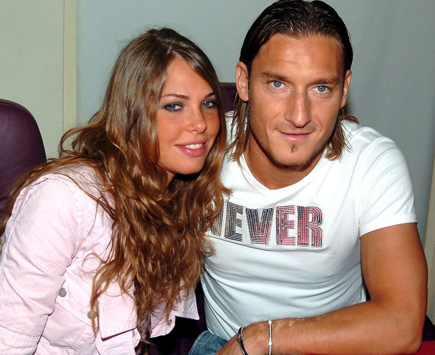 A 01 July 2005 photo AS Roma captain and Italian world cup winner Francesco Totti (R) with his wife, television presenter Ilary Blasi. Ilary gave birth to their second child, a baby girl called Chanel ...