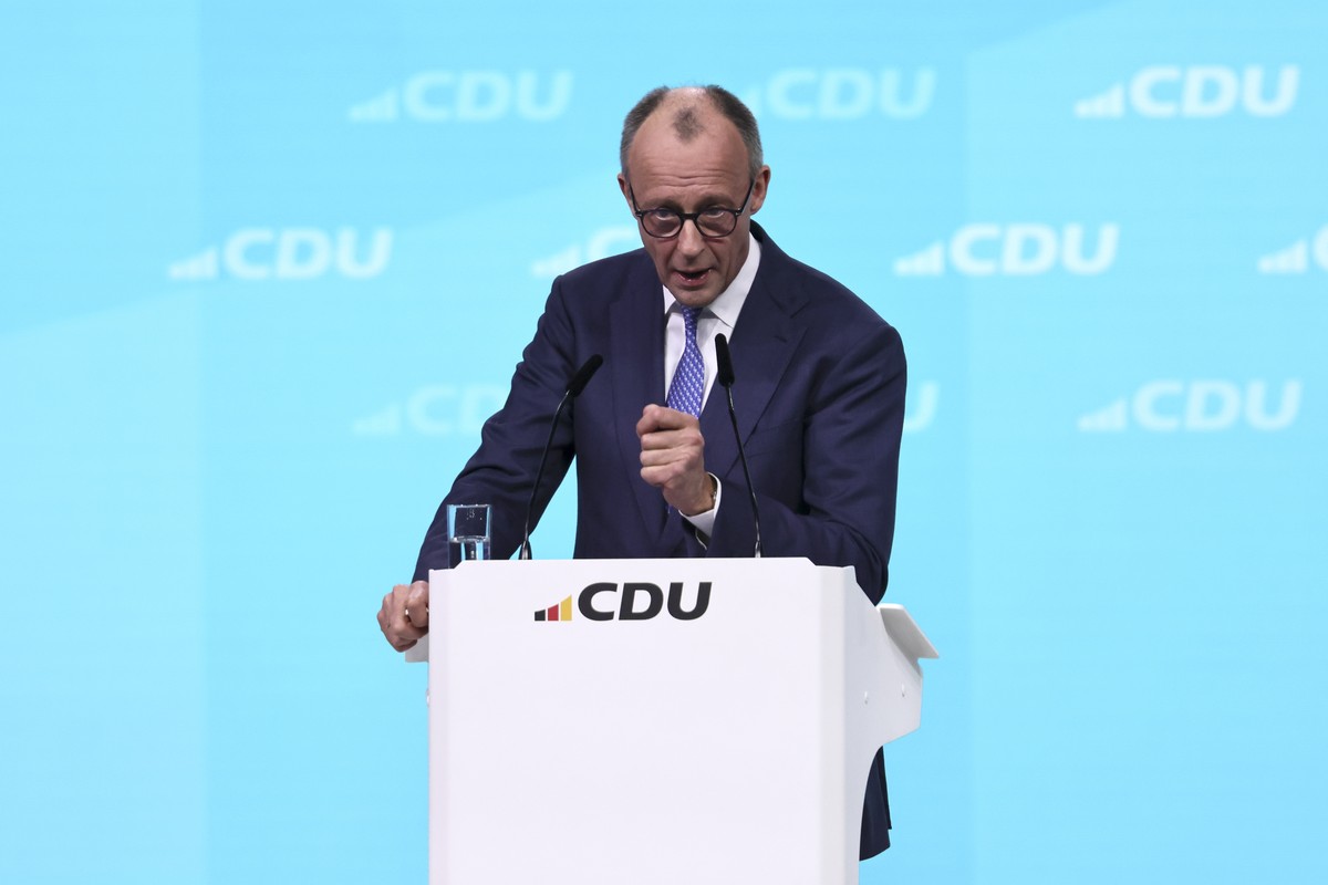 epa12761239 German Chancellor Friedrich Merz speaks during the 38th Federal party convention of Democratic Union (CDU) party in Stuttgart, Germany, 20 February 2026. The federal party convention takes ...