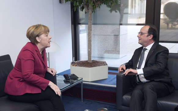 Merkel und Hollande am Rande der Verhandlungen in Brüssel.
