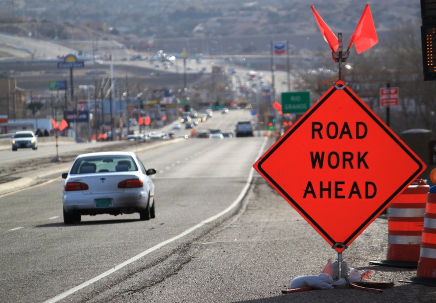 Construction signs warn drivers on US Route 550 as crews prepare to begin work on the highway in Bernalillo, N.M., on Friday, Feb. 19, 2015. New Mexico lawmakers are scrambling to find ways to fill th ...