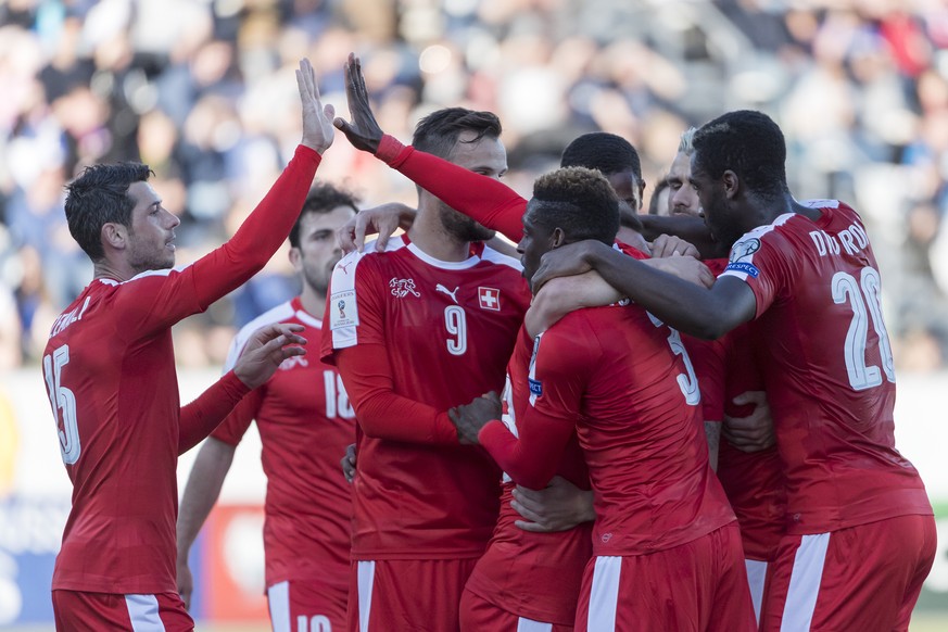 Switzerland&#039;s players cheer after scoring during the 2018 Fifa World Cup Russia group B qualification soccer match between Switzerland and Faroe Islands at the Torsvollur football stadium in Tors ...