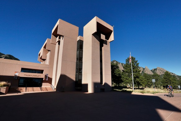 FILE - A man rides a bike to work at a U.S. National Center for Atmospheric Research facility in Boulder, Colo., Oct. 1, 2013. (AP Photo/Brennan Linsley, File)
Trump Climate Lab