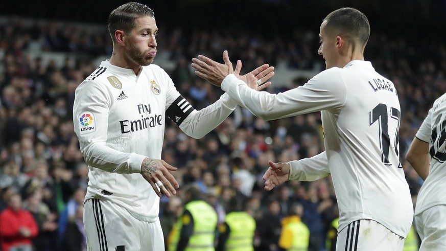 Real Madrid&#039;s Sergio Ramos, left, celebrates after scoring during a Spanish Copa del Rey soccer match between Real Madrid and Girona in Madrid, Spain, Thursday, Jan. 24, 2019. (AP Photo/Manu Fern ...