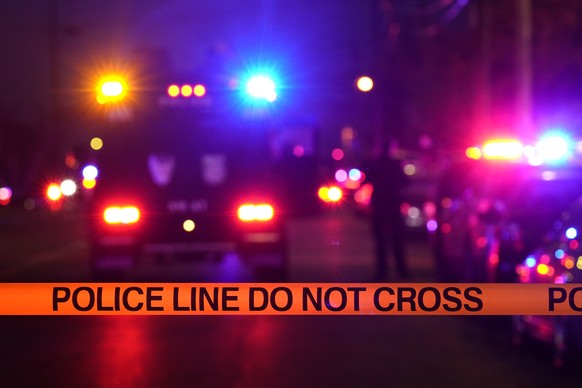 Police tape blocks the street near the scene of a shooting in Sacramento, Calif., Monday, Feb. 28, 2022. (AP Photo/Rich Pedroncelli)