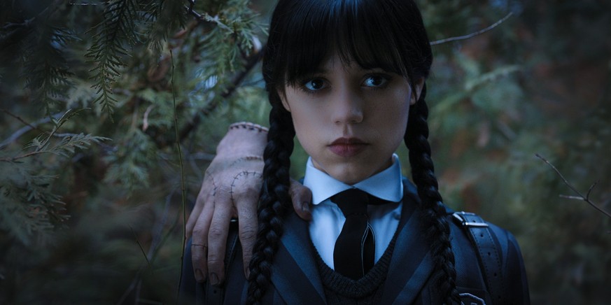 Wednesday. (L to R) Thing, Jenna Ortega as Wednesday Addams in episode 104 of Wednesday. Cr. Courtesy of Netflix © 2022