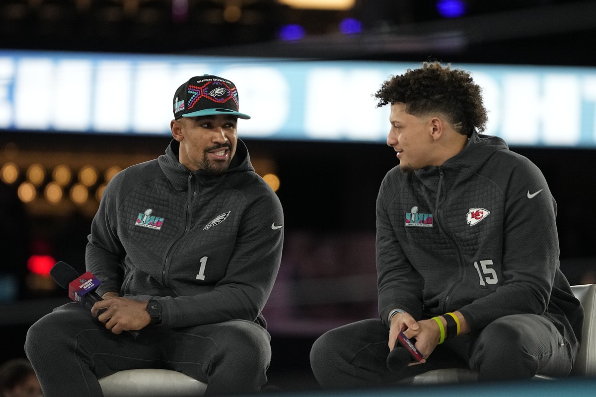 Kansas City Chiefs quarterback Patrick Mahomes, right, and Philadelphia Eagles quarterback Jalen Hurts speak to the media during the NFL football Super Bowl 57 opening night, Monday, Feb. 6, 2023, in  ...