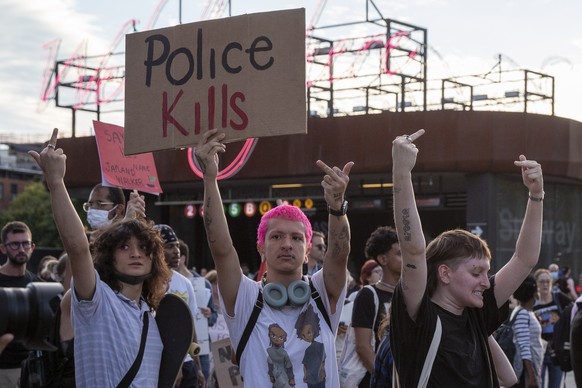 epa10056233 People march for Jayland Walker, a black man killed by police officers in Akron, Ohio, and in protest of racist policing in New York, New York, USA, 06 July 2022. On 27 June 2022, Akron po ...