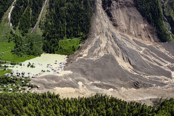 KEYPIX - A aerial view captured one day after a massive avalanche, triggered by the collapse of the Birch Glacier, shows the destruction it caused as it swept down to the valley floor and demolishing  ...