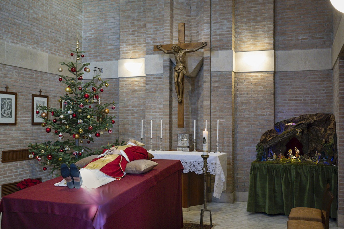 In this image released on Sunday, Jan. 1, 2023, by the Vatican Media news service late Pope Emeritus Benedict XVI is laid out in state in the chapel of the monastery 'Mater Ecclesiae' where  ...