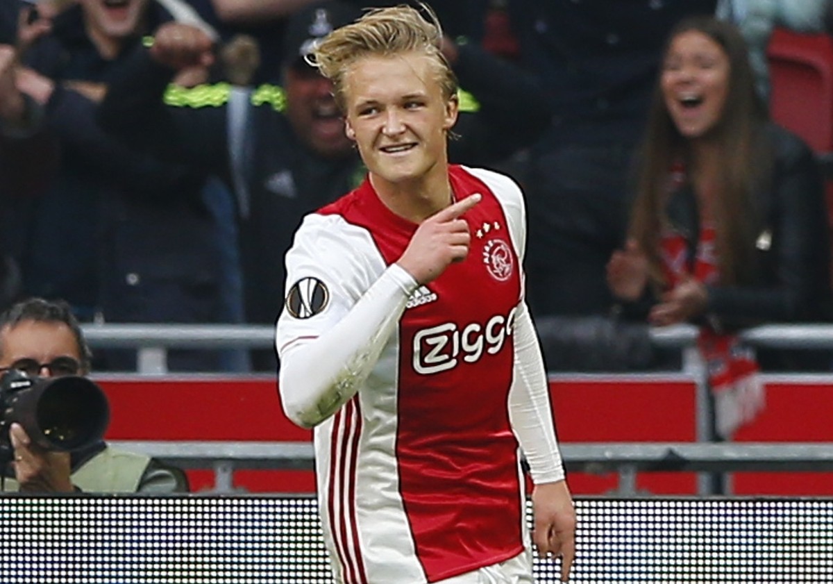 Ajax's Kasper Dolberg celebrates after scoring the second of his team during the first leg semi final soccer match between Ajax and Olympique Lyon in the Amsterdam ArenA stadium, Netherlands, Wed ...