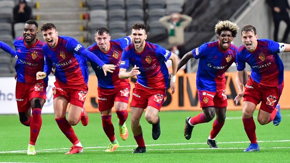 Basel players celebrate after defeating Hammarby IF on penalties during the European Conference League second leg play-off soccer match between Hammarby IF and FC Basel at Tele2 Arena in Stockholm, Sw ...