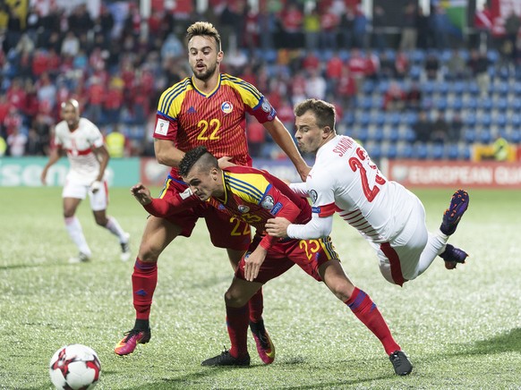 Andorra&#039;s Victor Rodriguez, hus Rubio and Switzerland&#039;s Xherdan Shaqiri, from left, fight for the ball during the 2018 Fifa World Cup Russia group B qualification soccer match between Andorr ...