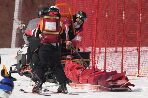 Yannick Chabloz, of Switzerland is stretchered-off the course after crashing during the downhill part of the men&#039;s combined at the 2022 Winter Olympics, Thursday, Feb.10, 2022, in the Yanqing dis ...