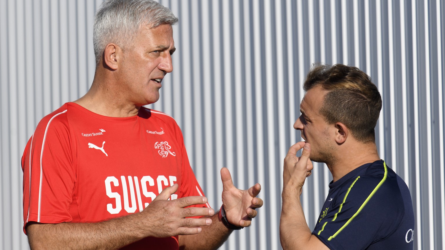 Switzerland&#039;s head coach Vladimir Petkovic, left, speaks with Switzerland&#039;s midfielder Xherdan Shaqiri, right, during a training session of the Switzerland&#039;s national soccer team at the ...