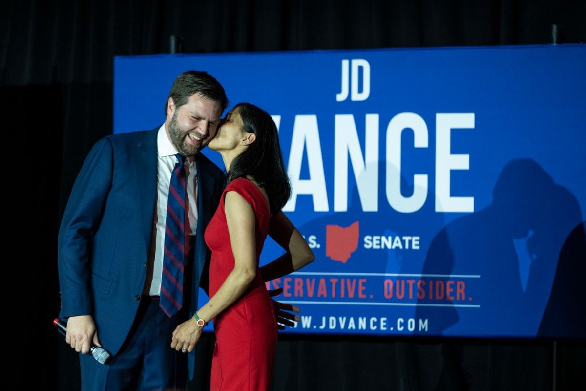 CINCINNATI, OH - MAY 3: Republican U.S. Senate candidate J.D. Vance receives a kiss from his wife Usha Vance after winning the primary, at an election night event at Duke Energy Convention Center on M ...