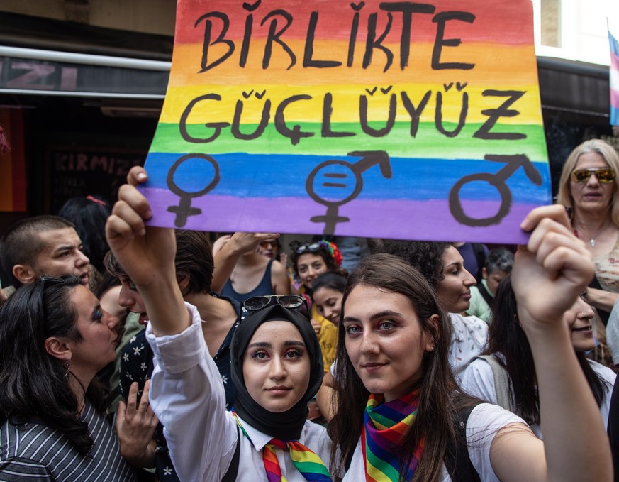 epa07685206 Members and sympathizers of the LGBTI (lesbian, gay, bisexual, transgender, and intersex) community participate in gay pride in Istanbul, Turkey, 30 June 2019. according to media reports,  ...