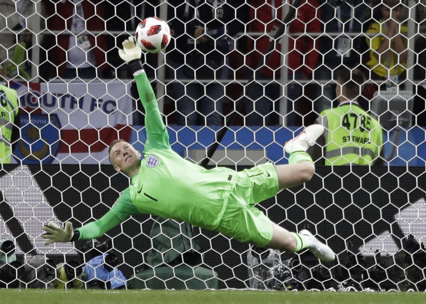 England goalkeeper Jordan Pickford saves a penalty during the round of 16 match between Colombia and England at the 2018 soccer World Cup in the Spartak Stadium, in Moscow, Russia, Tuesday, July 3, 20 ...