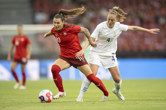 Swiss&#039; Ramona Bachmann, right, fights for the ball with England&#039;s Keira Walsh, left, during an international friendly test match between the national soccer team of Switzerland and England,  ...