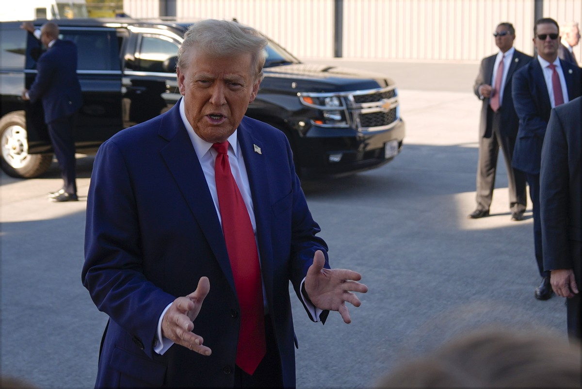 Republican presidential nominee former President Donald Trump talks with reporters as he arrives at Harrisburg International Airport, Sunday, Oct. 20, 2024, in Harrisburg, Pa. (AP Photo/Evan Vucci)
Do ...