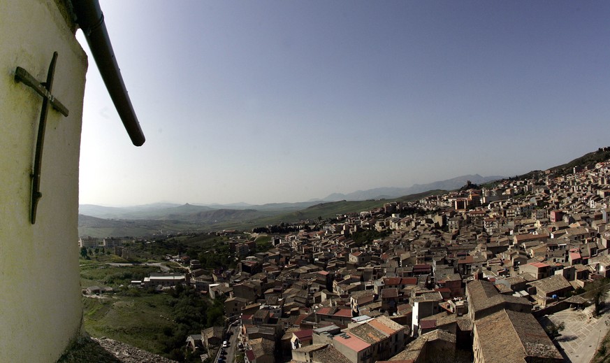 FILE -- In this file photo taken on April 24, 2006, a crucifix towers over Corleone, Italy. Premier Matteo Renzi’s Cabinet dissolved Corleone’s municipal government because of Mafia infiltrations and  ...