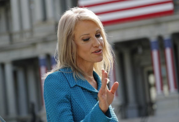 Counselor to the President Kellyanne Conway, speaks to a member of the media outside the West Wing of the White House in Washington, Friday, June 29, 2018. (AP Photo/Pablo Martinez Monsivais)