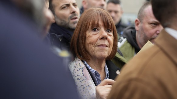 Gisele Pelicot exits the Avignon courthouse, in southern France, Dec. 19, 2024. (AP Photo/Lewis Joly)