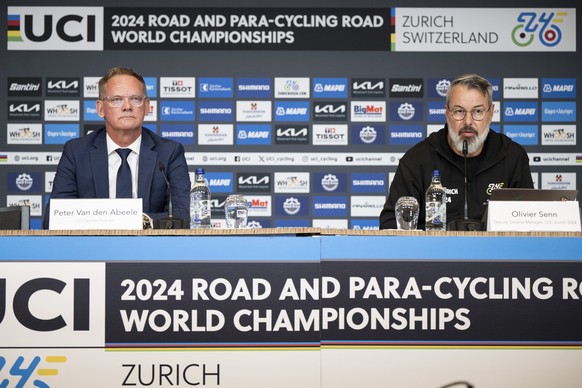 epa11628809 Peter Van den Abeele (L), UCI Sports Director, and Olivier Senn, Deputy General Manager LOC Zurich 2024, attend a media conference regarding the death of young Swiss cyclist Muriel Furrer  ...