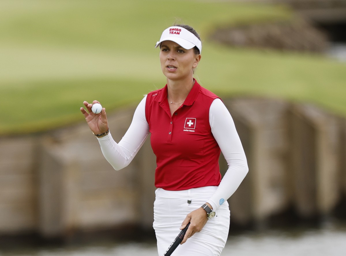epa11540054 Morgane Metraux of Switzerland reacts on the 16th green during the third round of the Paris 2024 Olympic Games Women Individual Stroke Play golf competition at Le Golf National in Guyancou ...
