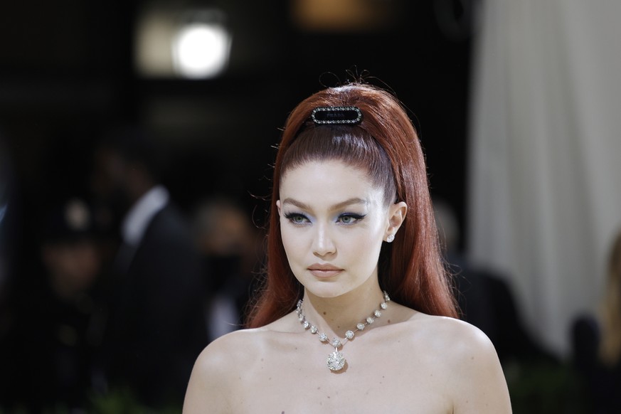 epa09466873 Gigi Hadid poses on the red carpet for the 2021 Met Gala, the annual benefit for the Metropolitan Museum of Art&#039;s Costume Institute, in New York, New York, USA, 13 September 2021. The ...