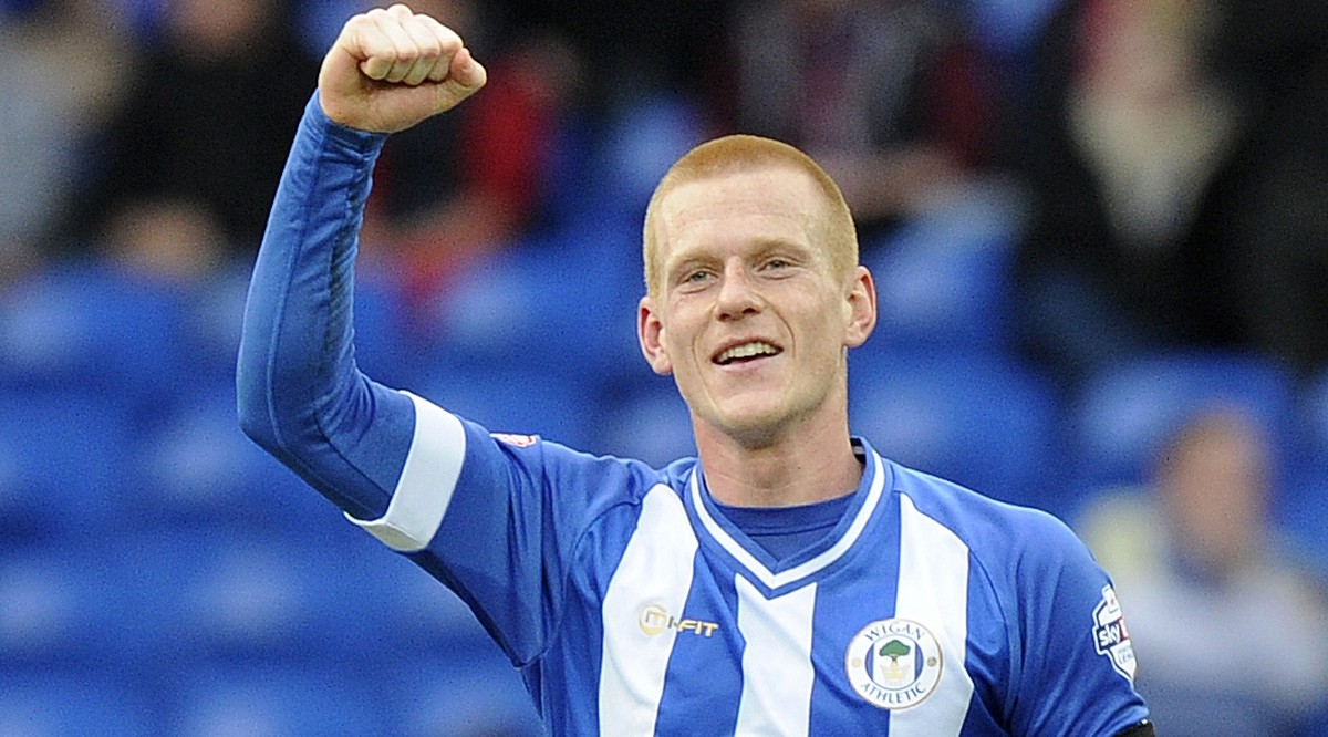Wigan's Ben Watson celebrates scoring a goal against Cardiff City, during their FA Cup soccer match at Cardiff City Stadium in Cardiff, Wales, February 15, 2014. REUTERS/Rebecca Naden (BRITAIN -  ...