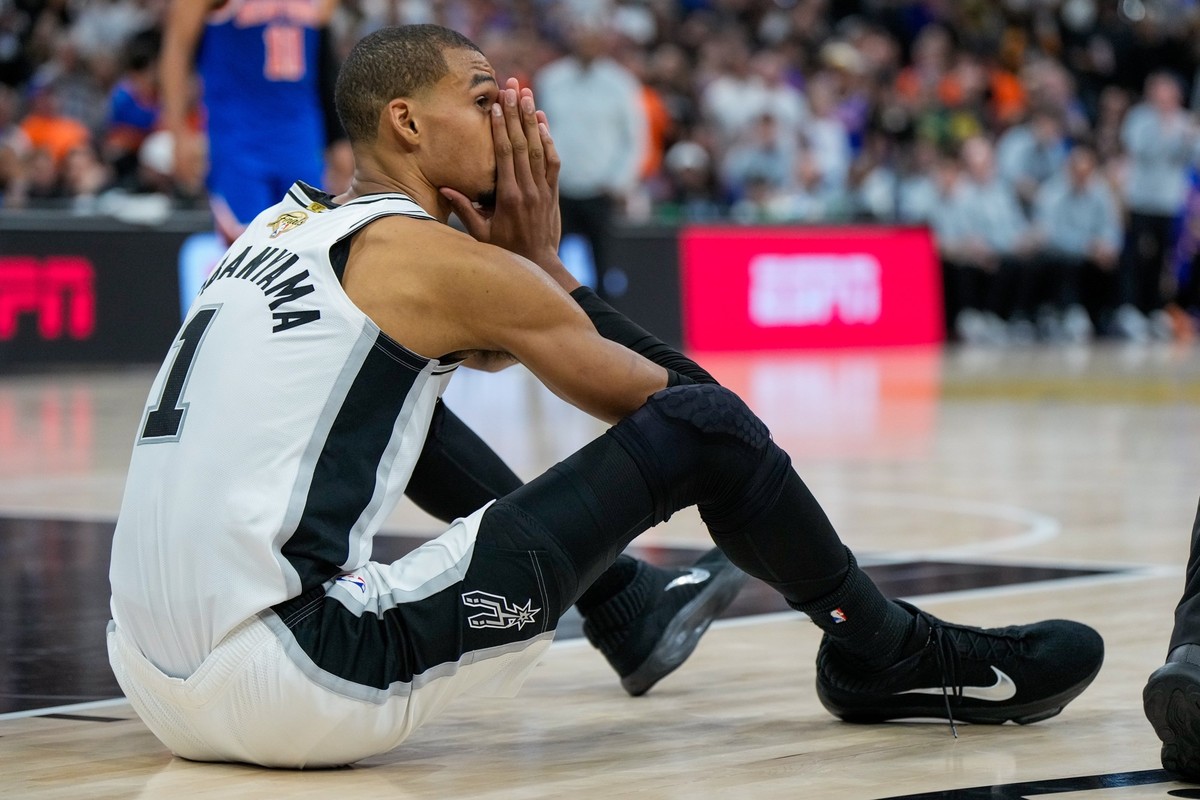 San Antonio Spurs forward Victor Wembanyama reacts after a foul call during the second half of Game 5 of the NBA Finals basketball series against the New York Knicks, Saturday, June 13, 2026, in San A ...