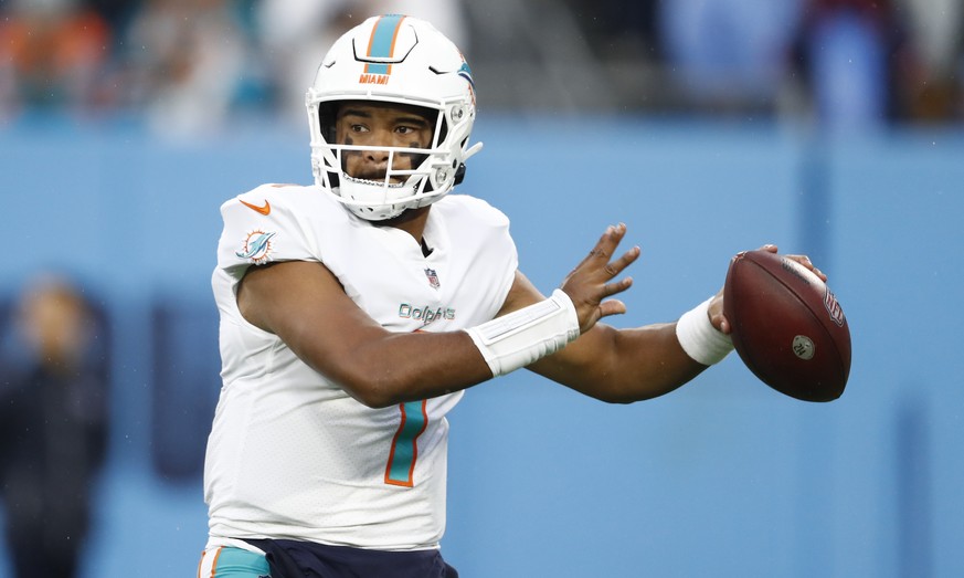 Miami Dolphins quarterback Tua Tagovailoa passes against the Tennessee Titans in the first half of an NFL football game Sunday, Jan. 2, 2022, in Nashville, Tenn. (AP Photo/Wade Payne)