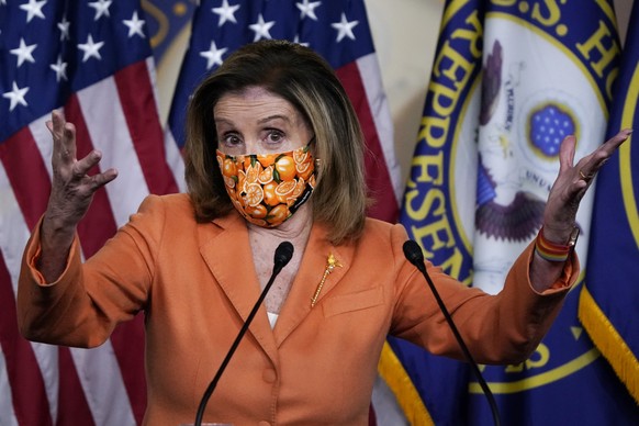 Speaker of the House Nancy Pelosi, D-Calif., meets with reporters at the Capitol in Washington, Thursday, Oct. 8, 2020. Negotiations between Pelosi and Treasury Secretary Steven Mnuchin for an additio ...