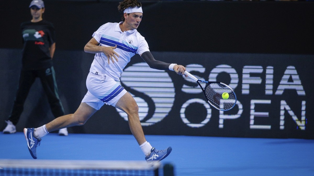 Switzerland's Marc-Andrea Huesler returns a shot during his match against Holger Rune from Denmark at the final of the 2022 Sofia Open ATP 250 tennis tournament in Sofia, Bulgaria, Sunday, Oct, 2 ...