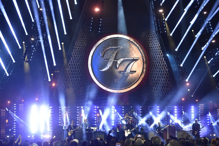 FILE - Dave Grohl and the Foo Fighters perform during the Rock &amp; Roll Hall of Fame induction ceremony on Oct. 31, 2021, in Cleveland. Kendrick Lamar, Foo Fighters and ODESZA will headline the Bonn ...
