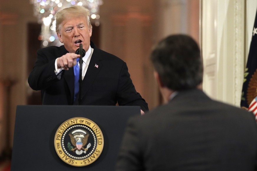 President Donald Trump points to CNN&#039;s Jim Acosta as he speaks during a news conference in the East Room of the White House, Wednesday, Nov. 7, 2018, in Washington. (AP Photo/Evan Vucci)