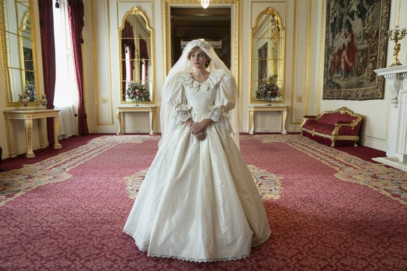 This image released by Netflix shows Emma Corrin in a scene from &quot;The Crown.&quot; Season four premieres on Sunday, Nov. 15. (Des Willie/Netflix via AP)