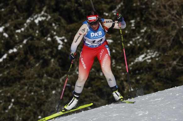 Switzerland&#039;s Lena Haecki-Gross competes during a Biathlon, women&#039;s World Cup 12.5-kilometer short individual event, in Antholz-Anterselva Italy, Friday, Jan.19, 2024. (AP Photo/Alessandro T ...