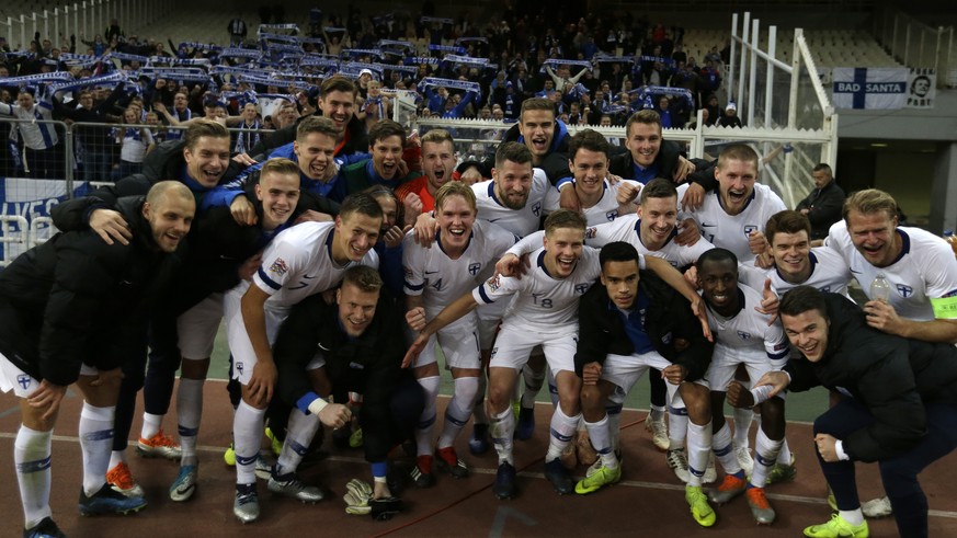 Finland players celebrate their qualification after the UEFA Nations League soccer match between Greece and Finland at Olympic stadium in Athens, Thursday, Nov. 15, 2018. (AP Photo/Thanassis Stavrakis ...