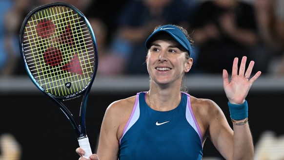 epa10410693 Belinda Bencic of Switzerland in action against Viktoriya Tomova of Bulgaria during their first round match at the 2023 Australian Open tennis tournament at Melbourne Park in Melbourne, Au ...