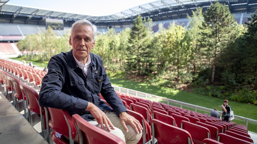 epa07819318 Swiss artist and art mediator Klaus Littmann poses for photographs during a press preview of the &#039;For Forest - The Unending Attraction of Nature&#039; art installation at the Woerther ...