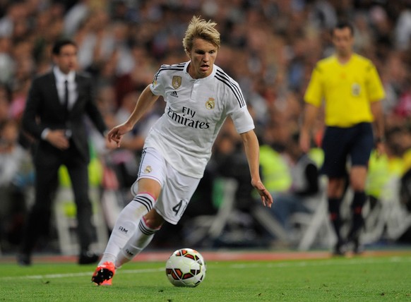 MADRID, SPAIN - MAY 23: Martin Odegaard of Real Madrid in action during the La Liga match between Real Madrid CF and Getafe CF at Estadio Santiago Bernabeu on May 23, 2015 in Madrid, Spain. (Photo by  ...